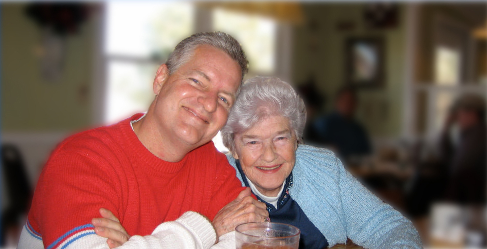 man and senior woman smiling