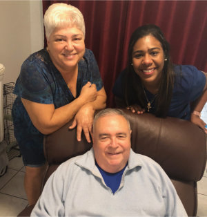 caregiver and seniors smiling